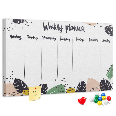 Pizarra de corcho con diseño de hojas tropicales para planificación semanal