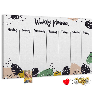 Pizarra de corcho con diseño de hojas tropicales para planificación semanal