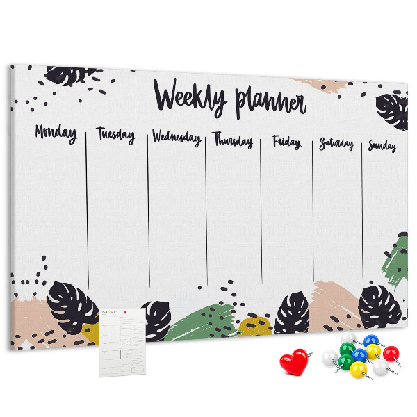 Pizarra de corcho con diseño de hojas tropicales para planificación semanal