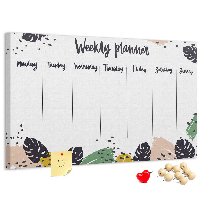 Pizarra de corcho con diseño de hojas tropicales para planificación semanal