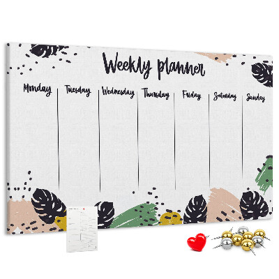 Pizarra de corcho con diseño de hojas tropicales para planificación semanal