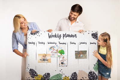 Pizarra de corcho con diseño de hojas tropicales para planificación semanal