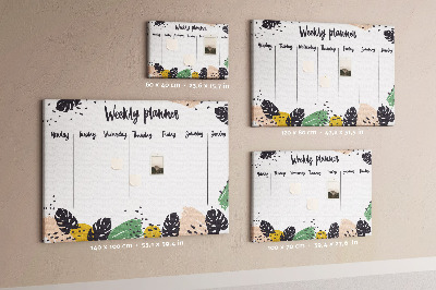 Pizarra de corcho con diseño de hojas tropicales para planificación semanal