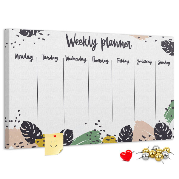 Pizarra de corcho con diseño de hojas tropicales para planificación semanal