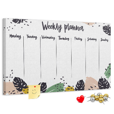 Pizarra de corcho con diseño de hojas tropicales para planificación semanal