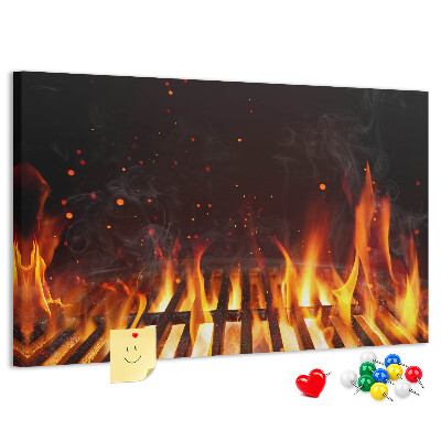 Pizarra de corcho Fuegos ardientes con la parrilla de fondo.