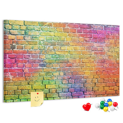 Tablero de corcho decorado Muro de ladrillos coloridos en un arcoíris