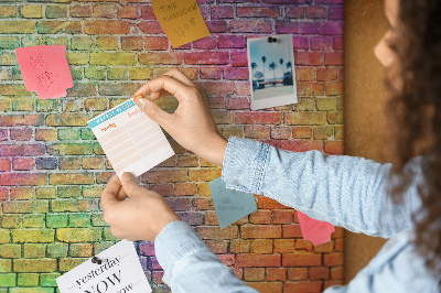 Tablero de corcho decorativo con diseño de muro de ladrillos coloridos en arcoíris
