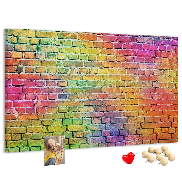 Tablero de corcho decorativo con diseño de muro de ladrillos coloridos en arcoíris