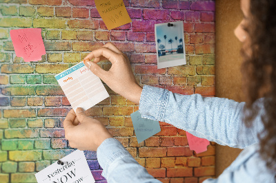 Tablero de corcho decorativo con diseño de muro de ladrillos coloridos en arcoíris
