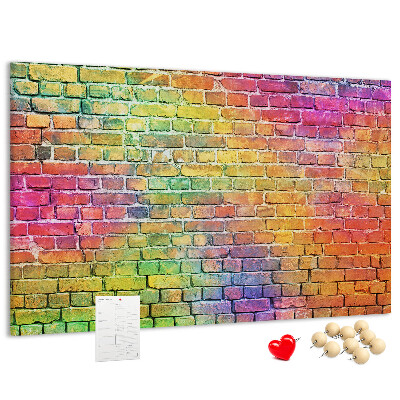 Tablero de corcho decorativo con diseño de muro de ladrillos coloridos en arcoíris