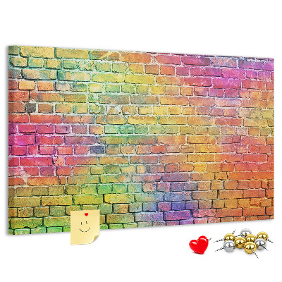 Tablero de corcho decorativo con diseño de muro de ladrillos coloridos en arcoíris