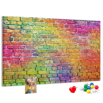 Tablero de corcho decorativo con diseño de muro de ladrillos coloridos en arcoíris