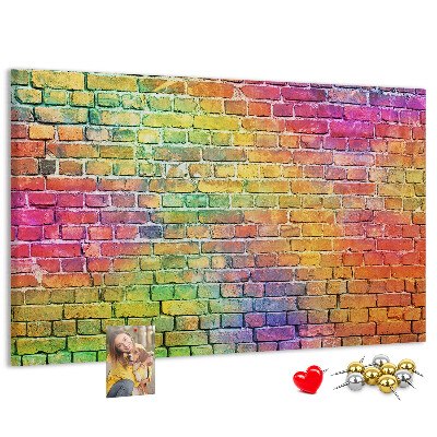 Tablero de corcho decorativo con diseño de muro de ladrillos coloridos en arcoíris