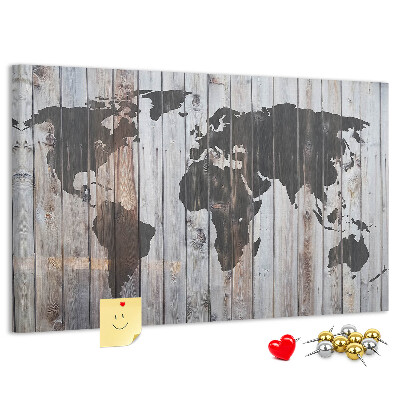 Pizarra de corcho mapamundi sobre un fondo de tablas de madera