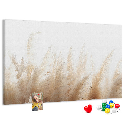 Tablero de corcho decorativo con diseño de hierbas delicadas sobre fondo claro