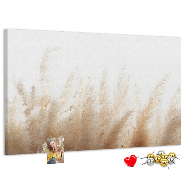 Tablero de corcho decorativo con diseño de hierbas delicadas sobre fondo claro