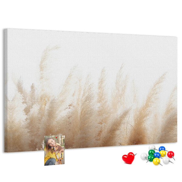 Tablero de corcho decorativo con diseño de hierbas delicadas sobre fondo claro