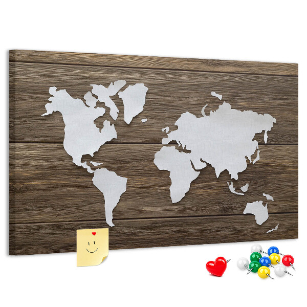 Tablero de anuncios mapa del mundo sobre un fondo de madera