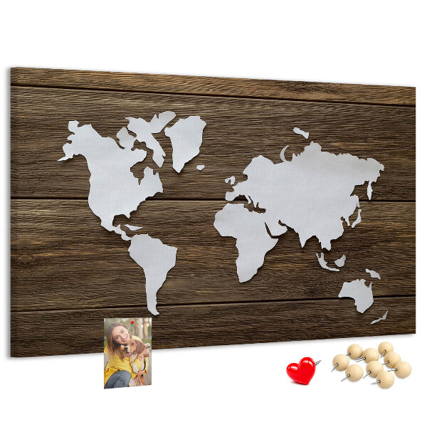 Tablero de anuncios mapa del mundo sobre un fondo de madera