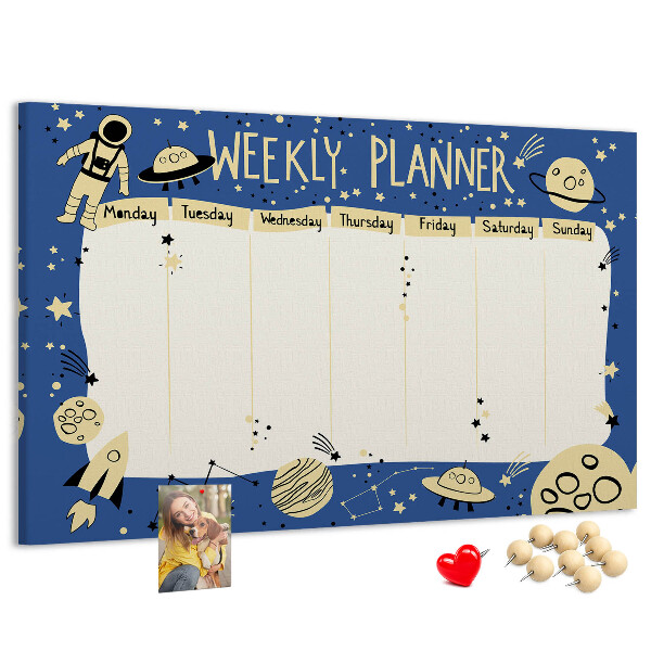 Tablero de corcho decorado planificador semanal con diseño de planetas y estrellas