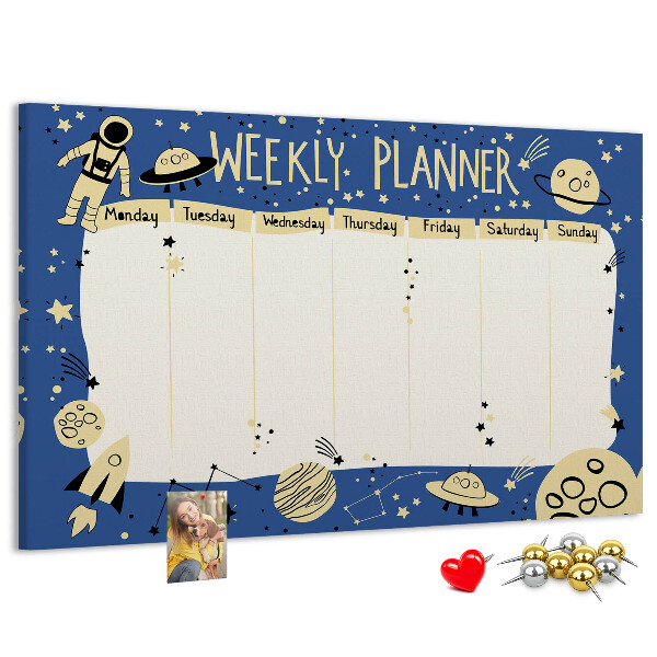Tablero de corcho decorado planificador semanal con diseño de planetas y estrellas