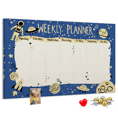Tablero de corcho decorado planificador semanal con diseño de planetas y estrellas