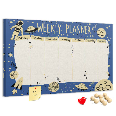 Tablero de corcho decorado planificador semanal con diseño de planetas y estrellas