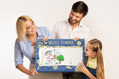 Tablero de corcho decorado planificador semanal con diseño de planetas y estrellas