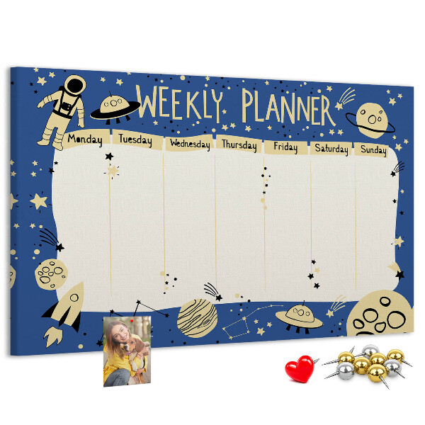 Tablero de corcho decorado planificador semanal con diseño de planetas y estrellas