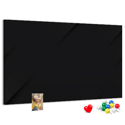 Pizarra de corcho con marco negro y chinchetas de colores