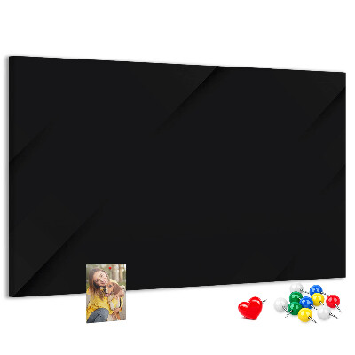 Pizarra de corcho con marco negro y chinchetas de colores