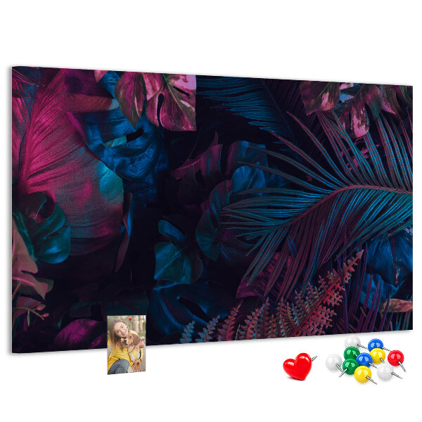 Tablero de corcho decorativo con diseño de hojas tropicales en colores intensos