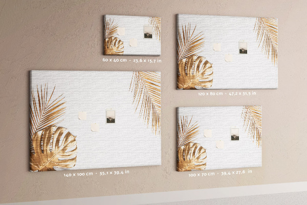 Pizarra de corcho con diseño de hojas doradas sobre fondo blanco