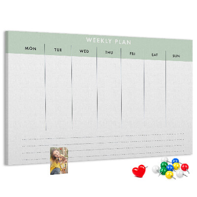 Pizarra de corcho con diseño de plan semanal y secciones claras