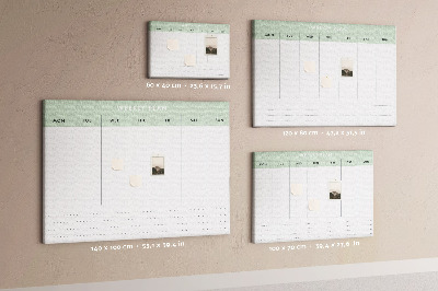 Pizarra de corcho con diseño de plan semanal y secciones claras