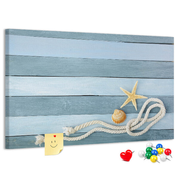 Pizarra de corcho con diseño de paisaje marino con conchas y cuerda