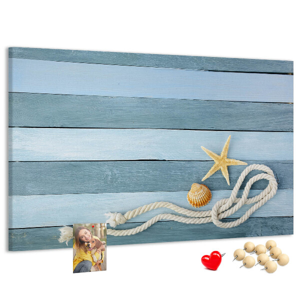 Pizarra de corcho con diseño de paisaje marino con conchas y cuerda