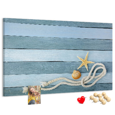 Pizarra de corcho con diseño de paisaje marino con conchas y cuerda