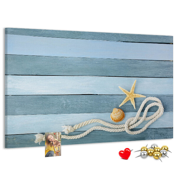Pizarra de corcho con diseño de paisaje marino con conchas y cuerda
