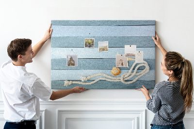 Pizarra de corcho con diseño de paisaje marino con conchas y cuerda