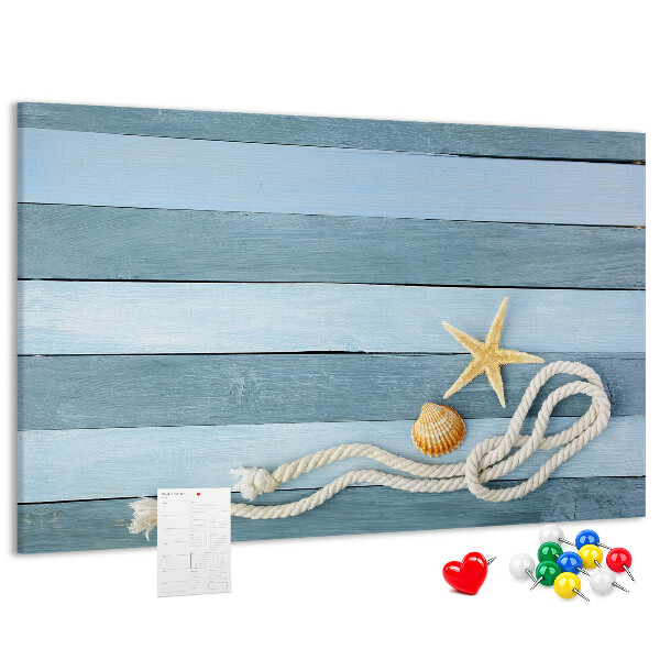Pizarra de corcho con diseño de paisaje marino con conchas y cuerda