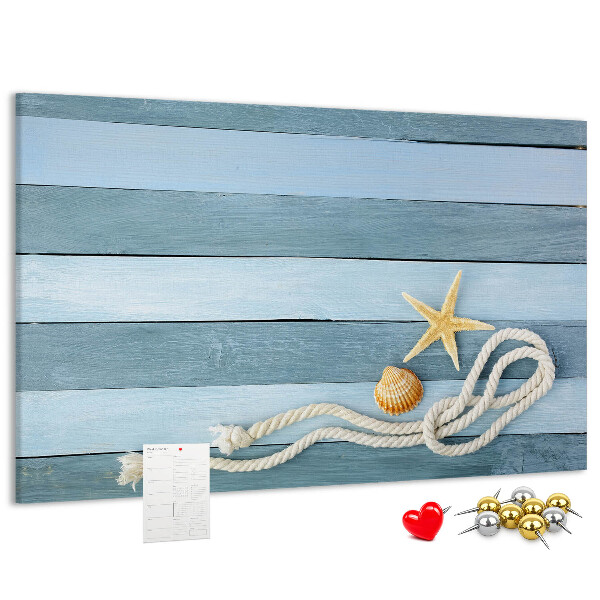 Pizarra de corcho con diseño de paisaje marino con conchas y cuerda