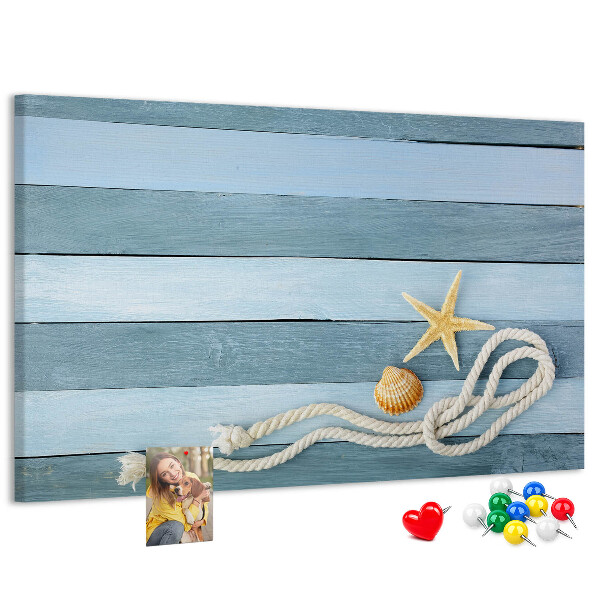 Pizarra de corcho con diseño de paisaje marino con conchas y cuerda