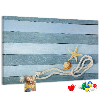 Pizarra de corcho con diseño de paisaje marino con conchas y cuerda