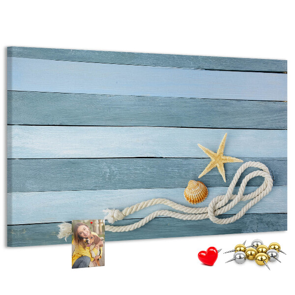 Pizarra de corcho con diseño de paisaje marino con conchas y cuerda