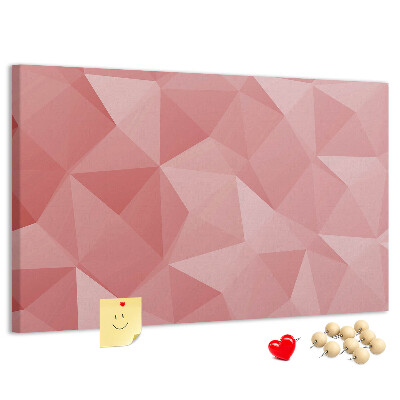 Pizarra de corcho con diseño geométrico en tonos rosas y beige