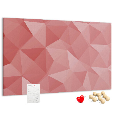 Pizarra de corcho con diseño geométrico en tonos rosas y beige
