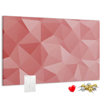 Pizarra de corcho con diseño geométrico en tonos rosas y beige