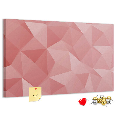 Pizarra de corcho con diseño geométrico en tonos rosas y beige